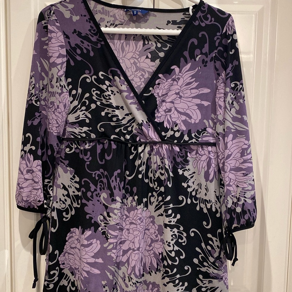 Reitman’s ladies blouse, long sleeve, long in length